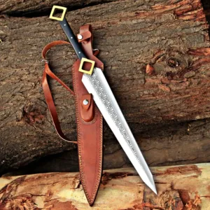 Handmade Forged Steel Sword – Premium Craftsmanship  This beautifully handcrafted sword is a true piece of art, designed for collectors, decor lovers, and meaningful gifting. Forged from high-quality steel, the blade features stunning wave-like patterns, giving it a unique and elegant look.  The sword comes with a handcrafted wooden scabbard, perfectly matching the rustic and medieval aesthetic. The handle is ergonomically designed with a strong grip, combining durability with style.  Whether you're a collector or looking for a memorable gift, this piece stands out with its craftsmanship and detail.  📏 Specifications Overall Length: 38 inches Blade Length: 30 inches Handle Length: 8 inches Material: Forged Steel Blade Handle: Wooden Grip with Metal Guard Scabbard: Premium Wooden Sheath 🎁 Perfect Gift For Anniversary Gift Birthday Gift Gift for Him Groomsmen Gift Collector’s Item Home & Office Decor 🚚 Shipping  We offer fast and reliable shipping through FedEx & UPS. Each item is securely packed to ensure safe delivery worldwide.  🛠️ Care Instructions Keep dry after use Apply light oil to maintain blade shine Store in scabbard when not in use Avoid long exposure to moisture 💬 Why Choose Us? 100% Handmade Craftsmanship Premium Quality Materials Unique & Custom Design Carefully Inspected Before Shipping